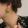 A girl with summer silver needle earrings made of colored acrylic, featuring a niche design, a fashionable and retro style, and a cold Korean style A girl with summer silver needle earrings made of colored acrylic, featuring a niche design, a fashionable and retro style, and a cold Korean style