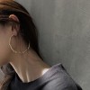 The new trendy and fashionable exaggerated irregular large ring earrings are a simple and individual slimming accessory for women The new trendy and fashionable exaggerated irregular large ring earrings are a simple and individual slimming accessory for women