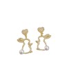 Easter asymmetrical stud earrings, a popular online celebrity, are exquisite and versatile earrings with a niche design. They are cross-border diamond-encrusted and pearles-encrusted
