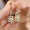 Real gold electroplated geometric water drop cat's eye stone earrings are versatile and slimming for the face. The water drop earrings have a niche design and are earrings for women