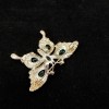 Retro light luxury emerald rhinestone butterfly brooch for women, summer anti-glare shawl buckle pin, small suit jacket accessory Retro light luxury emerald rhinestone butterfly brooch for women, summer anti-glare shawl buckle pin, small suit jacket accessory