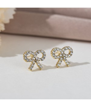 Korean version of light luxury pearl bow stud earrings, a trendy and high-end ear accessory, small and versatile s925 silver needle earrings