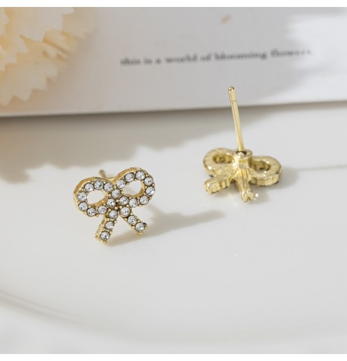 Korean version of light luxury pearl bow stud earrings, a trendy and high-end ear accessory, small and versatile s925 silver needle earrings Korean version of light luxury pearl bow stud earrings, a trendy and high-end ear accessory, small and versatile s925 silver needle earrings