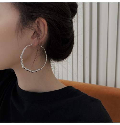 The new trendy and fashionable exaggerated irregular large ring earrings are a simple and individual slimming accessory for women The new trendy and fashionable exaggerated irregular large ring earrings are a simple and individual slimming accessory for women