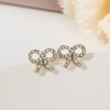 Korean version of light luxury pearl bow stud earrings, a trendy and high-end ear accessory, small and versatile s925 silver needle earrings Korean version of light luxury pearl bow stud earrings, a trendy and high-end ear accessory, small and versatile s925 silver needle earrings
