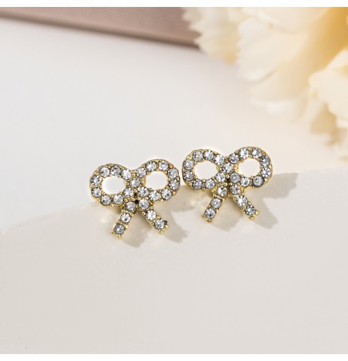 Korean version of light luxury pearl bow stud earrings, a trendy and high-end ear accessory, small and versatile s925 silver needle earrings Korean version of light luxury pearl bow stud earrings, a trendy and high-end ear accessory, small and versatile s925 silver needle earrings