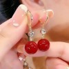 New trendy and retro red pearl earring style best-selling high-end and elegant niche earrings, round face slimming earrings for women