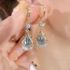 Real gold electroplated geometric water drop cat's eye stone earrings are versatile and slimming for the face. The water drop earrings have a niche design and are earrings for women