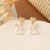 Easter asymmetrical stud earrings, a popular online celebrity, are exquisite and versatile earrings with a niche design. They are cross-border diamond-encrusted and pearles-encrusted