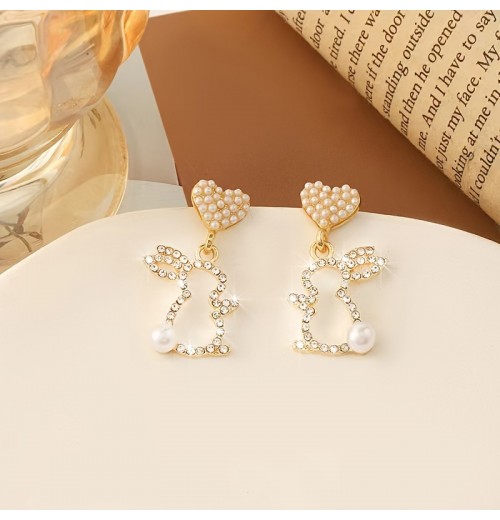 Easter asymmetrical stud earrings, a popular online celebrity, are exquisite and versatile earrings with a niche design. They are cross-border diamond-encrusted and pearles-encrusted