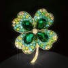 Wholesale of crystal four-leaf clover brooches, New Year's simple and versatile brooches for women, elegant corsages, and clothing accessories