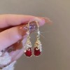 The new PI Xiu retro earrings are trendy, niche and high-end for women, with an elegant and grand style. They are red earrings and pendants The new PI Xiu retro earrings are trendy, niche and high-end for women, with an elegant and grand style. They are red earrings and pendants