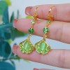 The light luxury and high-end green ginkgo leaf cat's eye stone long tassel earrings are fashionable and elegant, and are popular earrings for women