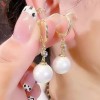 New trendy and retro red pearl earring style best-selling high-end and elegant niche earrings, round face slimming earrings for women