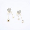 TEMU is selling a pair of fashionable and elegant heart-shaped tassel earrings with a unique asymmetrical full diamond heart and two pairs of stud earrings TEMU is selling a pair of fashionable and elegant heart-shaped tassel earrings with a unique asymmetrical full diamond heart and two pairs of stud earrings