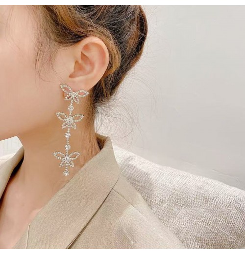 The new 925 silver needle wedding photo long tassel earrings for women who are diamond earrings exude a sense of elegance and sophistication The new 925 silver needle wedding photo long tassel earrings for women who are diamond earrings exude a sense of elegance and sophistication