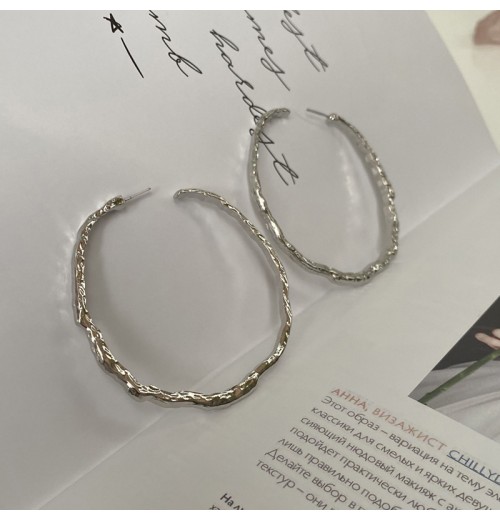 The new trendy and fashionable exaggerated irregular large ring earrings are a simple and individual slimming accessory for women The new trendy and fashionable exaggerated irregular large ring earrings are a simple and individual slimming accessory for women