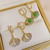 Cat's eye stone ginkgo leaf earrings, with a niche design sense, high-end cold style, and silver ear studs, a new luxury item for women in Cat's eye stone ginkgo leaf earrings, with a niche design sense, high-end cold style, and silver ear studs, a new luxury item for women in