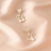 Easter asymmetrical stud earrings, a popular online celebrity, are exquisite and versatile earrings with a niche design. They are cross-border diamond-encrusted and pearles-encrusted