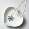 This cross-border snowflake design necklace from Europe and America, set with a zircon exquisite pendant, is a fashionable Christmas accessory for women and a versatile item This cross-border snowflake design necklace from Europe and America, set with a zircon exquisite pendant, is a fashionable Christmas accessory for women and a versatile item