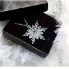 This cross-border snowflake design necklace from Europe and America, set with a zircon exquisite pendant, is a fashionable Christmas accessory for women and a versatile item This cross-border snowflake design necklace from Europe and America, set with a zircon exquisite pendant, is a fashionable Christmas accessory for women and a versatile item