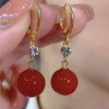 New trendy and retro red pearl earring style best-selling high-end and elegant niche earrings, round face slimming earrings for women