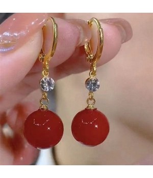 New trendy and retro red pearl earring style best-selling high-end and elegant niche earrings, round face slimming earrings for women