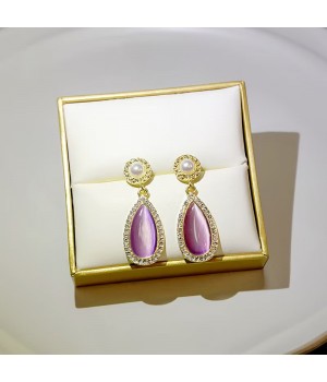 Cross-border bestseller French colored cat's eye stone earrings, vintage light luxury style glass stud earrings, new Chinese-style earrings in purple