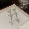 The new 925 silver needle wedding photo long tassel earrings for women who are diamond earrings exude a sense of elegance and sophistication The new 925 silver needle wedding photo long tassel earrings for women who are diamond earrings exude a sense of elegance and sophistication