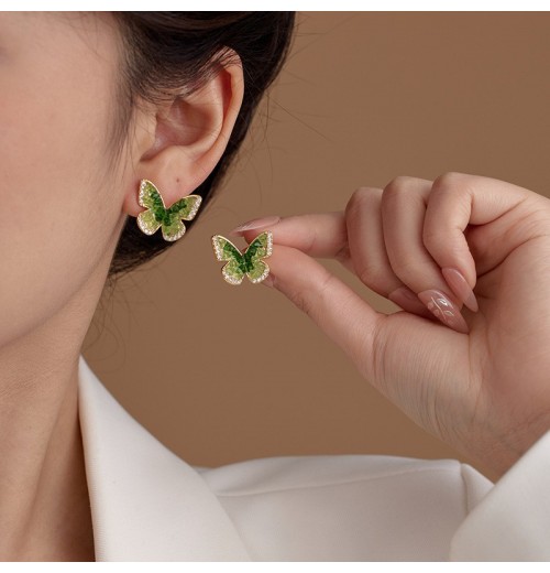 Butterfly earrings feature a light luxury, niche and simple design. They are versatile for women and have a high level of appearance. They are a popular online hit with universal ear studs in gradient colors Butterfly earrings feature a light luxury, niche and simple design. They are versatile for women and have a high level of appearance. They are a popular online hit with universal ear studs in gradient colors