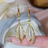 The new high-end golden dreamcatcher net earrings are fashionable, versatile and elegant for female Internet celebrities. Three lives and three worlds ear rings The new high-end golden dreamcatcher net earrings are fashionable, versatile and elegant for female Internet celebrities. Three lives and three worlds ear rings