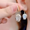 Long copper ring tassel earrings for female Internet celebrities that make the face look slimmer. Ear studs with a design that is versatile for Internet celebrities. Female imitation cat's eye stone earrings Long copper ring tassel earrings for female Internet celebrities that make the face look slimmer. Ear studs with a design that is versatile for Internet celebrities. Female imitation cat's eye stone earrings