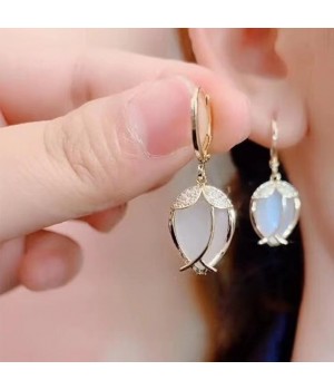 Long copper ring tassel earrings for female Internet celebrities that make the face look slimmer. Ear studs with a design that is versatile for Internet celebrities. Female imitation cat's eye stone earrings