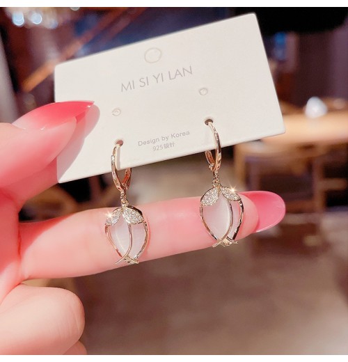Long copper ring tassel earrings for female Internet celebrities that make the face look slimmer. Ear studs with a design that is versatile for Internet celebrities. Female imitation cat's eye stone earrings Long copper ring tassel earrings for female Internet celebrities that make the face look slimmer. Ear studs with a design that is versatile for Internet celebrities. Female imitation cat's eye stone earrings